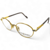side view of Silver Street Italy round eyeglasses with gold frames and brown temple tips, showcasing the classic round design and delicate detailing on the bridge and temples