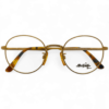 Sting Gold Round Glasses - Vintage-Inspired Frame with Tortoiseshell Accents - Al-Aziz Optical
