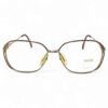 Front view of vintage Zeiss eyeglasses with 22kt gold electroplating, red detailing, and crystal accents.